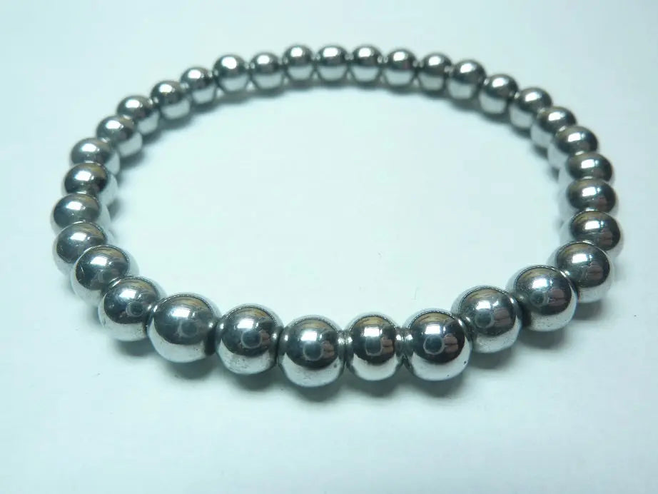 bracelet en hématite naturelle perles brillantes monté sur fil élastique robuste collection mixte bienfaits lithothérapie