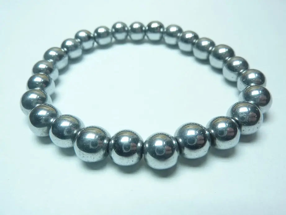 Bracelet en hématite naturelle perles rondes monté sur fil élastique pour ancrage et protection énergétique