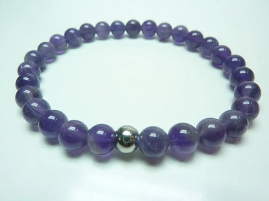 Bracelet en améthyste naturelle violette à perles rondes monté sur élastique solide pour apaiser stress et favoriser sérénité