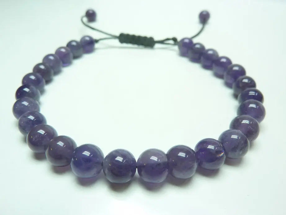 Bracelet réglable en améthyste naturelle avec perles violettes, apaisant et anti-stress.
