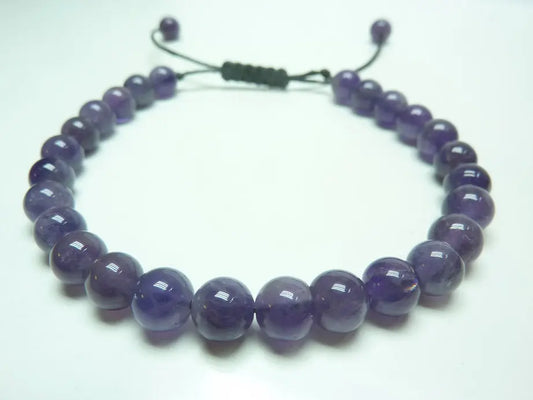 Bracelet réglable en améthyste naturelle avec perles violettes, apaisant et anti-stress.