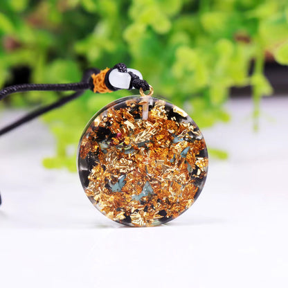 Pendentif Orgonite Œil d'Horus, Éclats de Pierres Naturelles mapierredeprotection