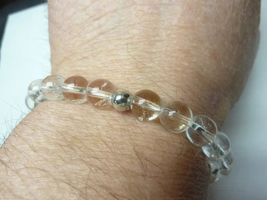 Bracelet en Quartz cristal de roche naturel transparent à perles rondes monté sur fil élastique, pour clarté mentale et énergie alignée.