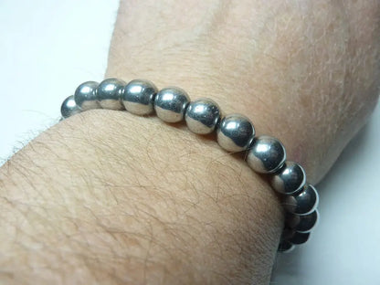 Bracelet en hématite naturelle perles rondes résistantes mixte lithothérapie protection et ancrage