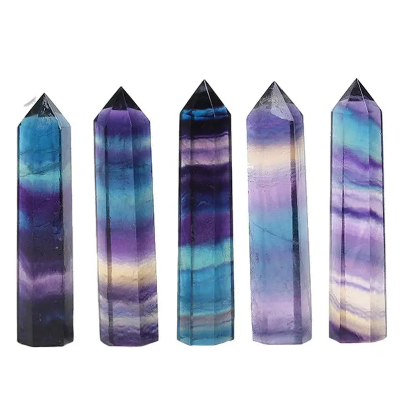Pointe Énergie Positive en Fluorite polie naturelle multicolore pour clarté mentale, équilibre émotionnel et purification énergétique.