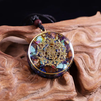 Pendentif Orgonite "Sri Yantra" en Turquoise et Oeil de Tigre MaPierreDeProtection®