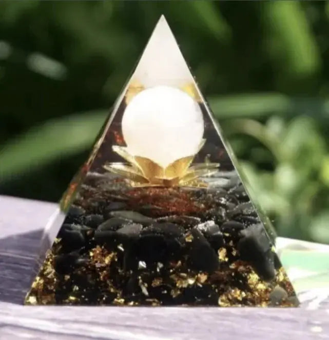 Orgonite Fleur de Lotus pyramid with black obsidian, rose quartz, and golden lotus flower inside, for protection and healing energy